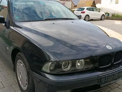 Używany BMW 520 150 KM (110 kW) 1998 Czarny Sedan/Limuzyna