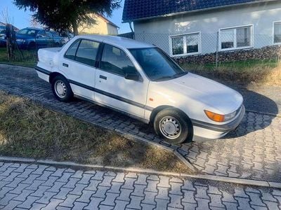 Second-hand Mitsubishi Lancer 90 CP (66 kW) 1992 Alb Berlinǎ