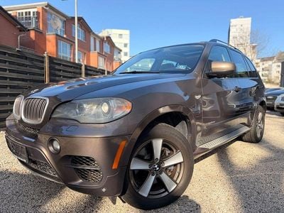 Second-hand BMW X5 Exclusive 286 CP (210 kW) 2011 Auriu SUV