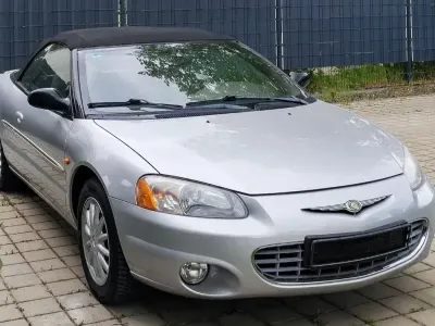 Second-hand Chrysler Sebring Cabriolet 203 CP (149 kW) 2003 Argintiu Cabrio