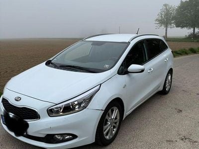 Second-hand Kia Ceed Sportswagon Edition 7 128 CP (94 kW) 2013 Alb Break