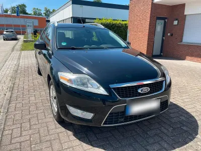 Używany Ford Mondeo 140 KM (102 kW) 2009 Czarny Kombi