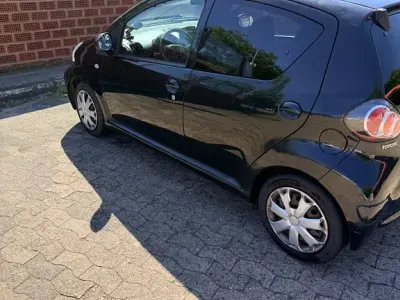 Gebraucht Toyota Aygo City 68 PS (50 kW) 2011 Schwarz Kleinwagen