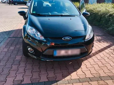 Gebraucht Ford Fiesta 81 PS (59 kW) 2011 Schwarz Kleinwagen