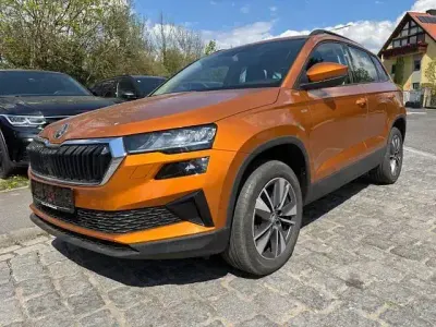 Gebraucht Skoda Karoq Tour 382 PS (280 kW) 2023 Orange SUV