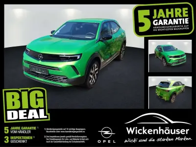 Gebraucht Opel Mokka Elegance 131 PS (96 kW) 2024 Lackierung matcha green/typ aussenverkle (metallic) SUV