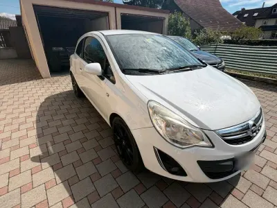 Second-hand Opel Corsa 84 CP (61 kW) 2012 Alb Hatchback