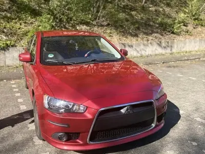 Gebraucht Mitsubishi Lancer 130 PS (95 kW) 2014 Rot Limousine