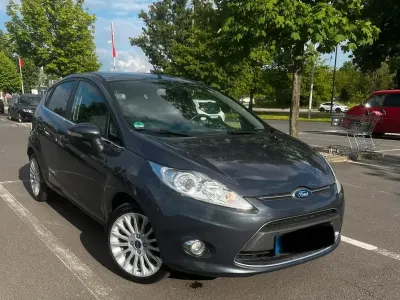 Używany Ford Fiesta 82 KM (60 kW) 2013 Szary Hatchback