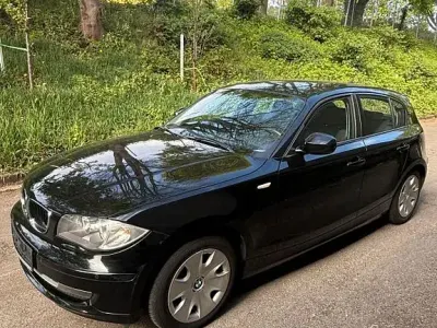 Gebraucht BMW 118 Sport Line 122 PS (89 kW) 2010 Schwarz Kleinwagen