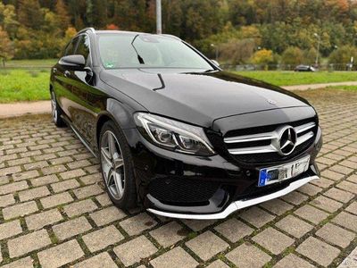 Schwarz metallic Gebraucht 2018 Mercedes C180 AMG Kombi | 23.990 €