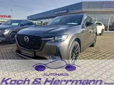 Gebraucht Mazda CX-60 Homura-Line 328 PS (241 kW) 2025 Machine gray SUV