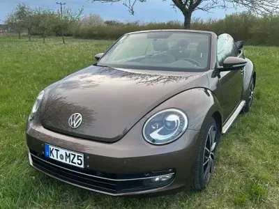 Używany VW Beetle 105 KM (77 kW) 2013 Brązowy Hatchback