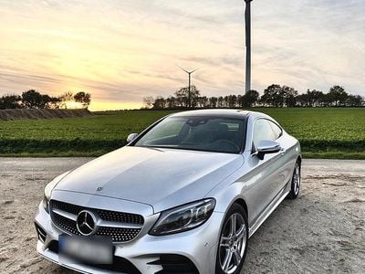 Second-hand Mercedes C200 AMG line 184 CP (135 kW) 2020 Argintiu Coupe