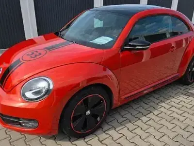 Używany VW Beetle CLUB 105 KM (77 kW) 2016 Pomarańczowy Hatchback