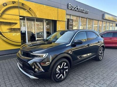 Gebraucht Opel Mokka-e Elegance 100 kW (136 PS) 2023 Karbon schwarz metallic SUV