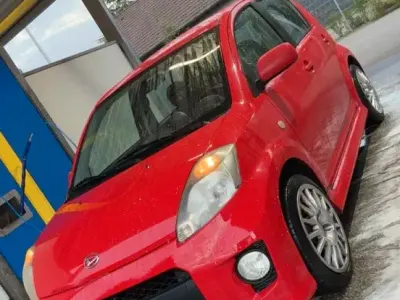 Gebraucht Daihatsu Sirion 87 PS (63 kW) 2005 Rot Kleinwagen