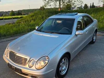 Second-hand Mercedes E200 Classic 122 CP (89 kW) 2003 Argintiu Berlinǎ