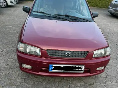Gebraucht Mazda Demio 73 PS (53 kW) 1999 Rot Kleinwagen