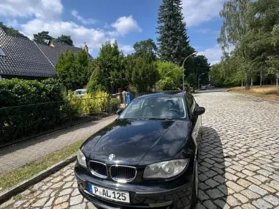 Gebraucht BMW 116 122 PS (89 kW) 2009 Schwarz Kleinwagen