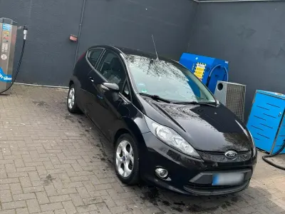 Gebraucht Ford Fiesta 71 PS (52 kW) 2012 Schwarz Kleinwagen