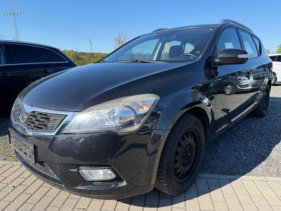 Second-hand Kia Ceed Sportswagon 116 CP (85 kW) 2011 Negru Break