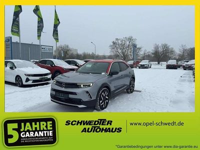 Gebraucht Opel Mokka Elegance 101 PS (74 kW) 2021 Kontrast grau/quarz silber SUV