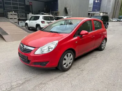 Second-hand Opel Corsa Edition 80 CP (58 kW) 2009 Roșu Hatchback