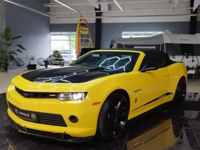 Gebraucht Chevrolet Camaro 318 PS (233 kW) 2015 Gelb Cabrio