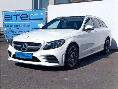 Gebraucht Mercedes C180 AMG 156 PS (114 kW) 2020 Polarweiss Kombi