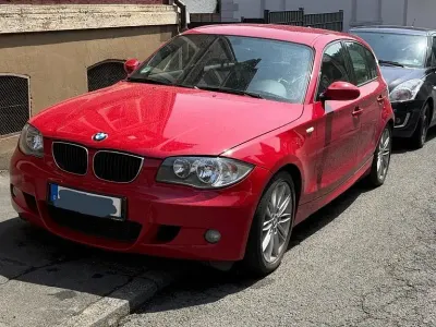 Gebraucht BMW 116 Sport Line 122 PS (89 kW) 2009 Rot Kleinwagen