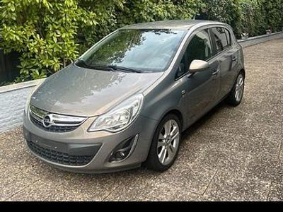 Używany Opel Corsa 87 KM (63 kW) 2012 Brązowy Hatchback