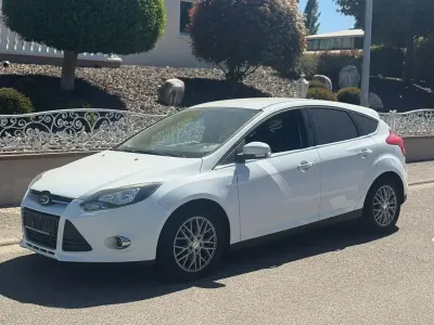 Second-hand Ford Focus Titanium 125 CP (91 kW) 2014 Alb Berlinǎ