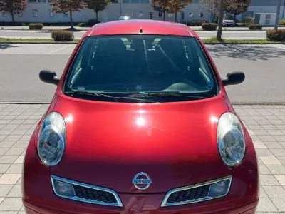 Occasion Nissan Micra Visia 65 PK (47 kW) 2009 Rood Sedan