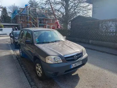 Używany Mazda Tribute Comfort 124 KM (91 kW) 2003 Szary SUV