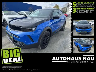 Gebraucht Opel Mokka 131 PS (96 kW) 2023 Perl blau/voltaik blau SUV