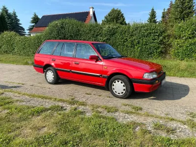 Używany Mazda 323 88 KM (64 kW) 1991 Czerwony Kombi