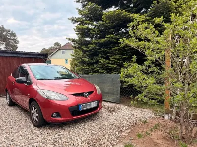 Gebraucht Mazda 2 75 PS (55 kW) 2008 Rot Kleinwagen