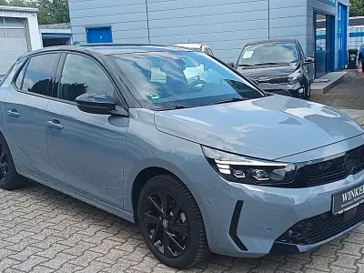 Gebraucht Opel Corsa 101 PS (74 kW) 2024 Grau mit schwarzem dach Kleinwagen