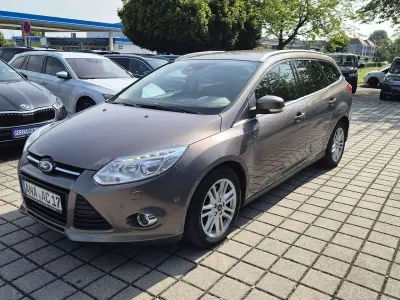 Gebraucht Ford Focus Titanium 140 PS (102 kW) 2013 Brisbane braun (met.) Kombi