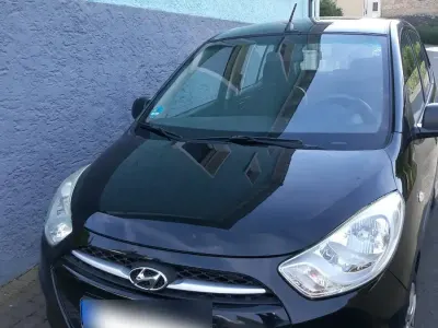 Gebraucht Hyundai i10 69 PS (50 kW) 2011 Schwarz Kleinwagen