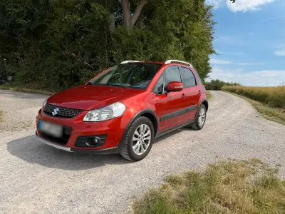 Gebraucht Suzuki SX4 119 PS (87 kW) 2013 Rot Kleinwagen