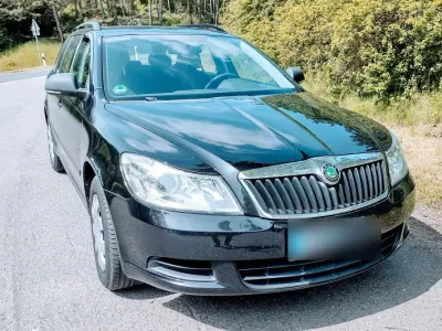 Używany Skoda Octavia Classic 105 KM (77 kW) 2011 Czarny Kombi