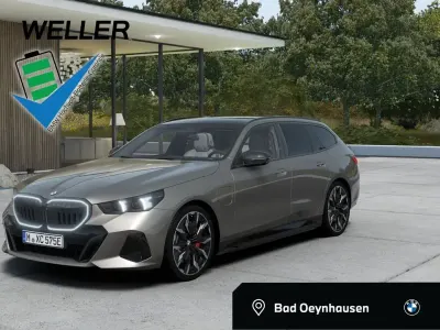 Gebraucht BMW 550e M Sport 489 PS (359 kW) 2025 Oxide grey ii (grau) Kombi