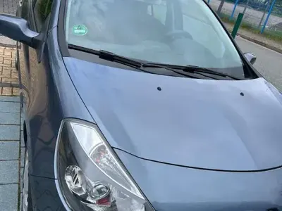 Używany Renault Clio II Dynamique 88 KM (64 kW) 2005 Niebieski Sedan/Limuzyna