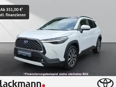 Gebraucht Toyota Corolla Cross Team 197 PS (144 kW) 2023 Pure) white ii (weiss SUV