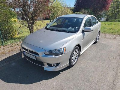 Second-hand Mitsubishi Lancer 117 CP (86 kW) 2012 Argintiu Berlinǎ