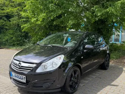 Używany Opel Corsa Edition 60 KM (44 kW) 2009 Czarny Hatchback