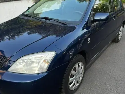 Gebraucht Toyota Corolla 97 PS (71 kW) 2003 Blau Limousine