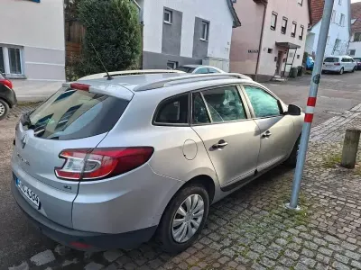 Używany Renault Mégane Expression 106 KM (77 kW) 2011 Szary Sedan/Limuzyna